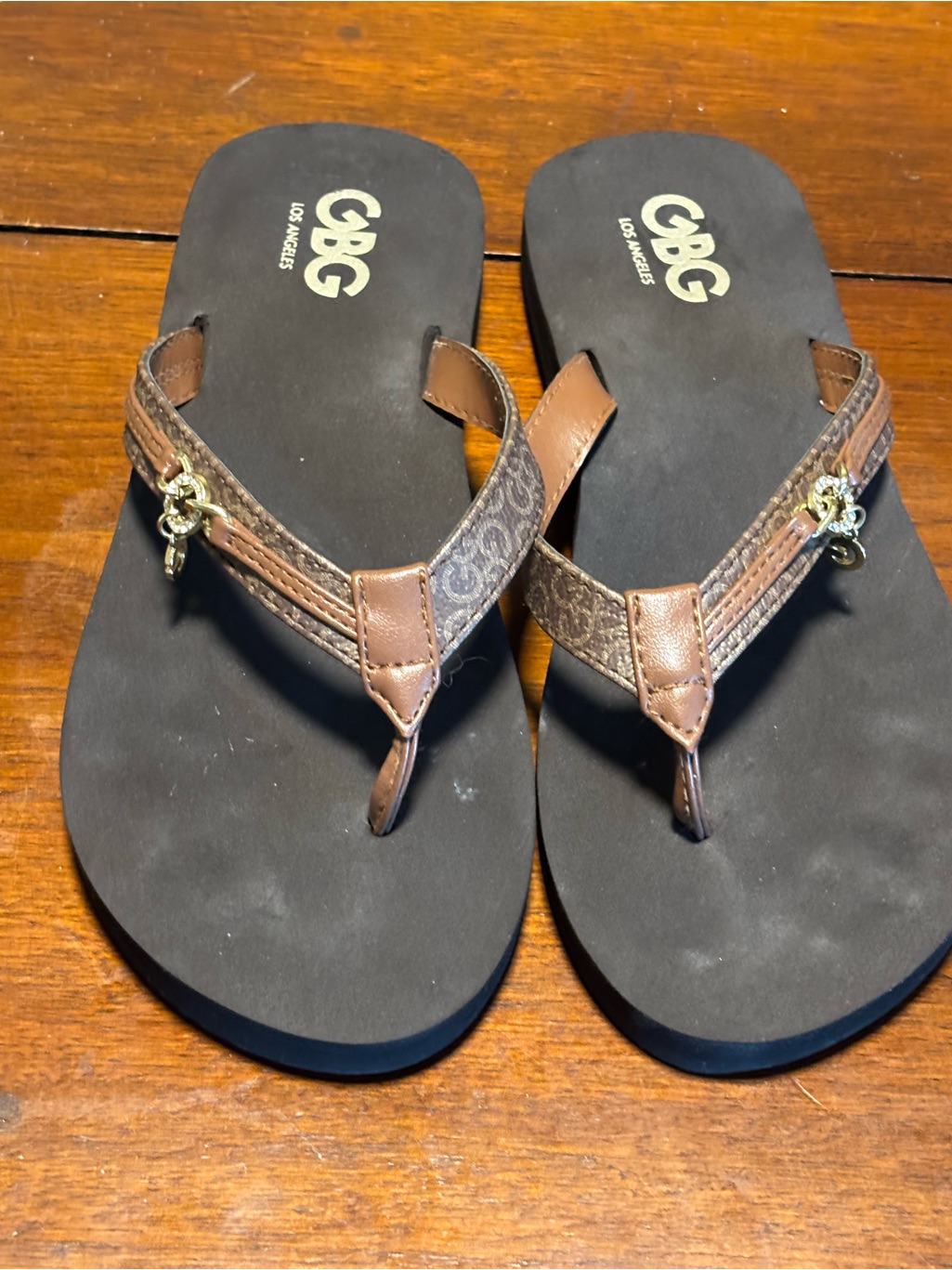 Gbg Los Angeles Brown And Black Patterned Thong Sandals With Gold Charm
